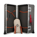 Suitcase - TRUNK ON WHEELS L Aluminum Steel Grey With Red Leather Handles